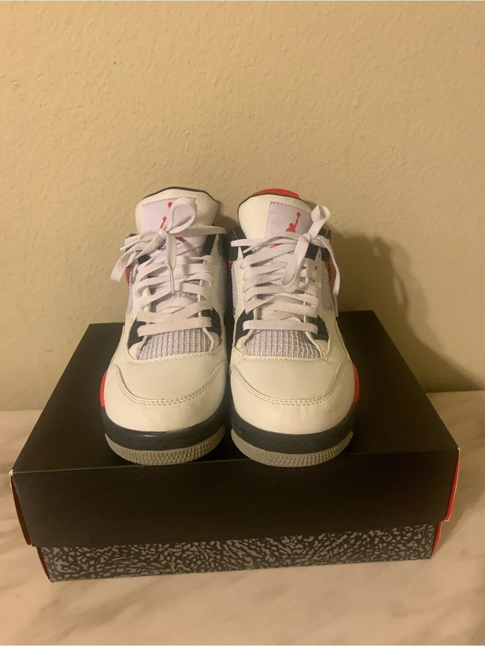 Jordan Retro 4 Sneakers in White/Red/Black
